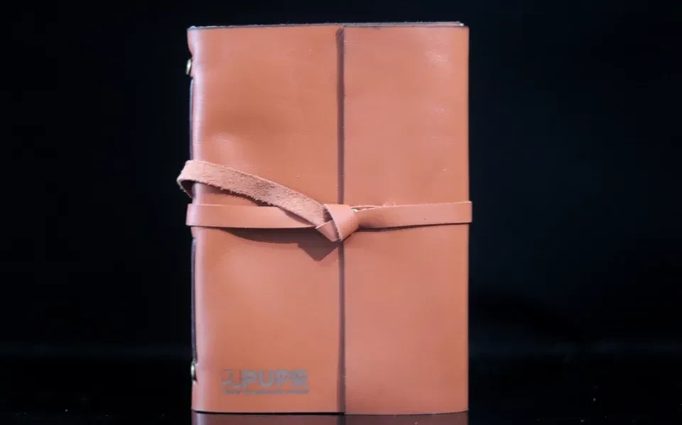 Leather journal for Kementerian PUPR, wrap closure